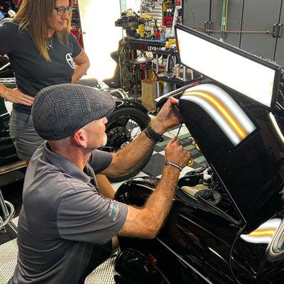 Dusty working his magic on a vintage Mini Cooper