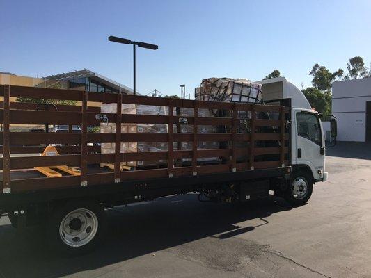 22' Stake bed with lift gate moves 8 to 10 pallets same day