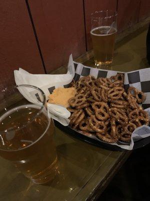 Pretzels and beer cheese.  Fits well with Cream Ale.