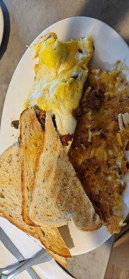 Bacon eggs hash browns and toast