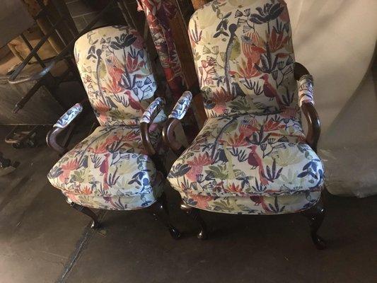 re-upholstered arm chairs