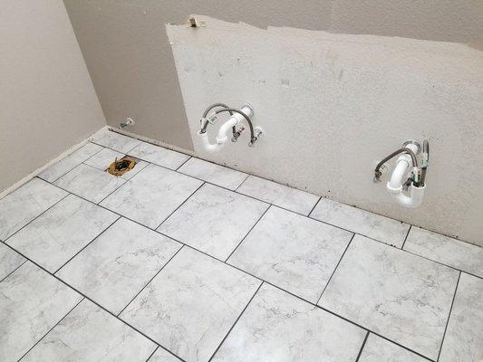 Ceramic tile on 2nd floor bathroom with uncoupling waterproof underlayment.