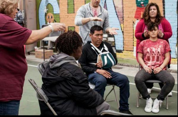 Working on the homeless and the volunteers at a Lunch On Me event in Skid Row.