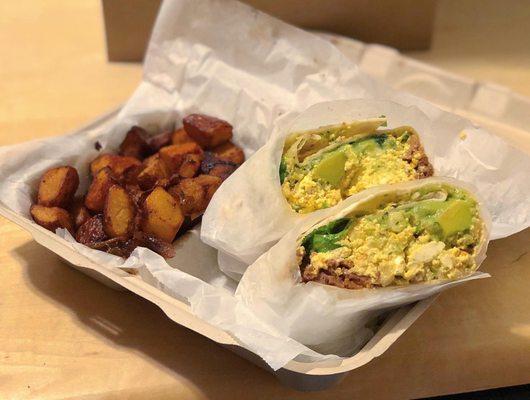 Southwest Burrito with scrambled tofu and vegan cheese sauce