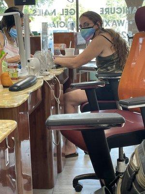 Tiffany getting her nails done