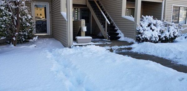 The left sidewalk is what a shoveled sidewalk looks like to ACCU Inc.