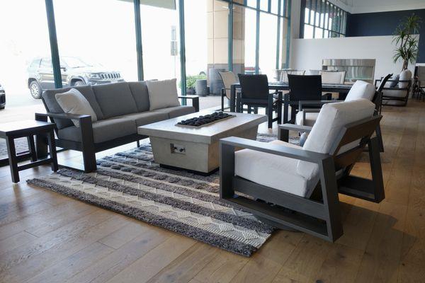 A Novara collection from Ebel in Smoke finish with an American Fyre Designs Fire pit