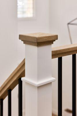 Solid White oak treads, 6084 handrail and black iron bars