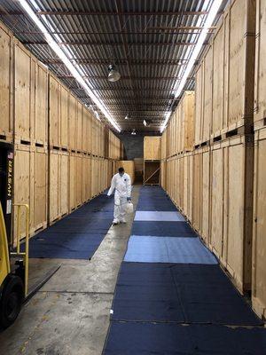 Disinfecting and sanitizing our warehouse and packing blankets to prevent the spread of COVID-19.