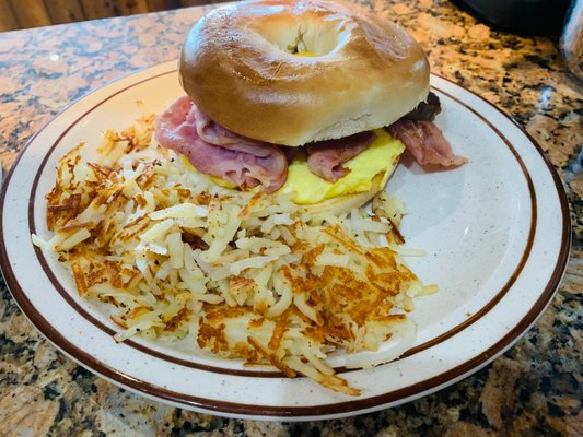 Breakfast Bagel Mae with scramble eggs  smoke ham and fresh hash browns