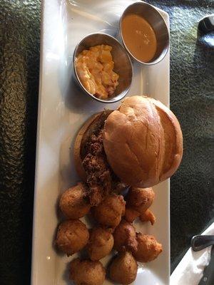 Chicken on a bun, pimento cheese & hush puppies.