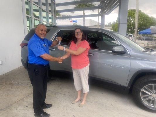 Jose handing over the keys to our new 2023 Chevy Traverse