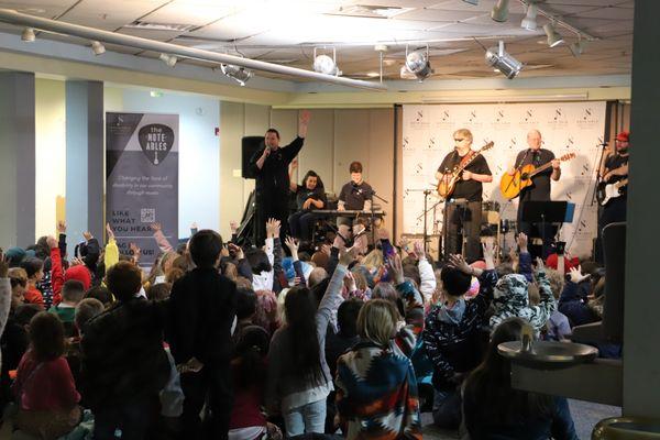 Kids interacting with The Note-Ables Band.