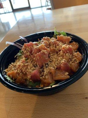 My own concoction of poke. Salmon and tuna on white rice.