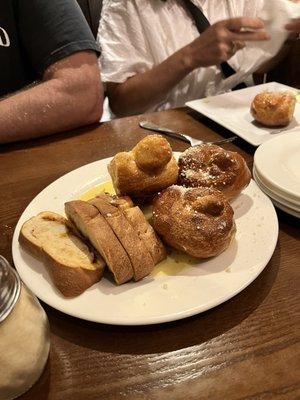 Cheesy garlic bread and garlic knots, free with the meal