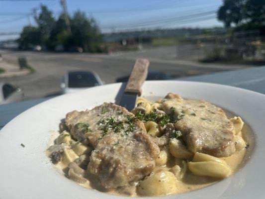 mushroom sauce, pork chops, and cheese tortellini