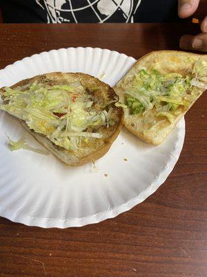 carne asada torta  the meat is underneath the lettuce