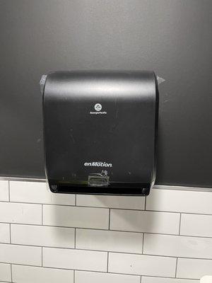 After commercial paper towel dispenser installed at Legacy DC, DC based art gallery.