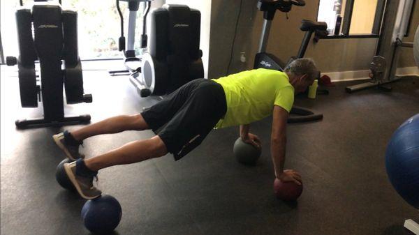 Push ups on med balls. All core