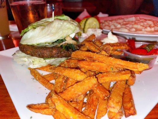 Vegetarian burger with no bun and sweet potato fries