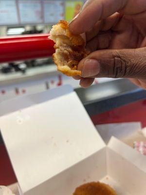 Store-bought chicken strips nuts freshly battered