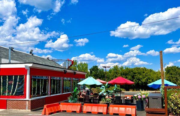 Their well decorated covered patio and outdoor seating