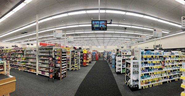 View from main entrance. Follow the dark grey carpet forward and to the left to get to the pharmacy.