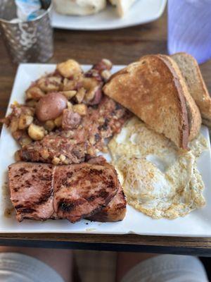 Katy's Combo breakfast with 2 eggs, toast, potatoes, ham and corned beef hash.