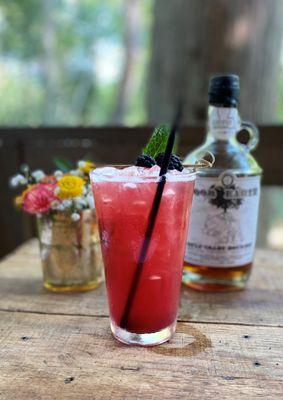 Blackberry Bourbon Lemonade, made with fresh blackberries stewed in Good Earth Whiskey from Bayou Terrebonne Distillers.