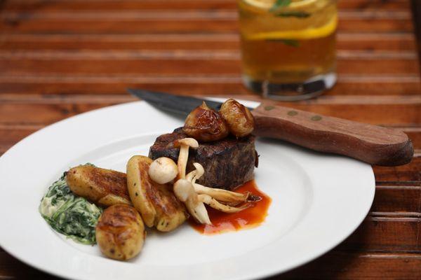 Grilled Tenderloin, Spinach Souffle, Smashed Fingerling Potatoes, Roasted Mushrooms, Pearl Onions, Housemade Steak Sauce.