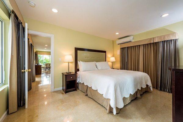 Typical bedroom in the apartments of The Villas Las Olas Hotel'Apart