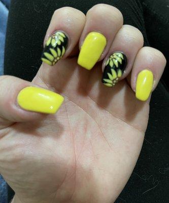 My sunflower nails done at a last minute walk in!!!!