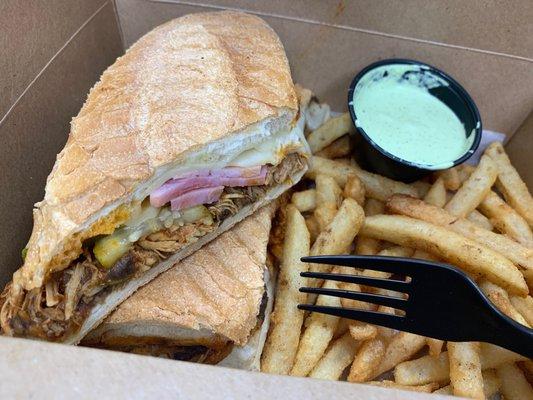 Tinga Cubano Sandwich comes with a side of fries. The green sauce was refreshingly tangy. A new place to try out in Chinatown.