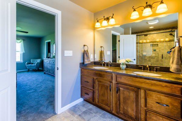 A double sink vanity is a popular choice for master bathrooms in new construction homes.