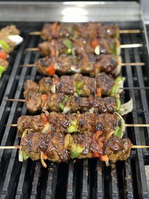 24hr Marinated Steak and Chicken Pinchos. Grilled to perfection and served with our house BBQ sauce and side of garlic bread.