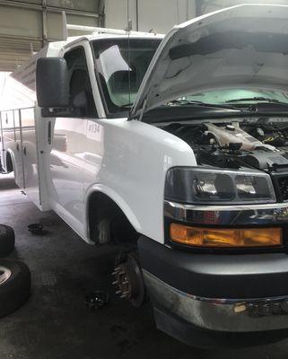 GMC utility vehicle in for some work