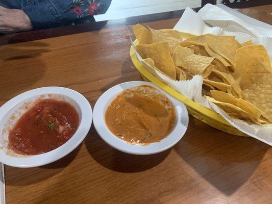 Complimentary chips, red and chipotle salsas.