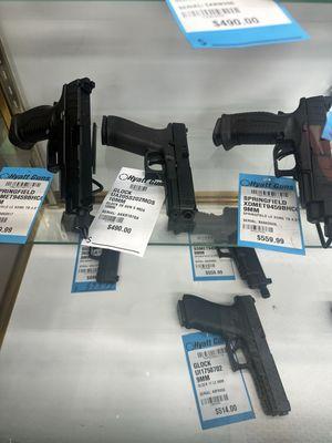 Several firearms in the blue label qualified case