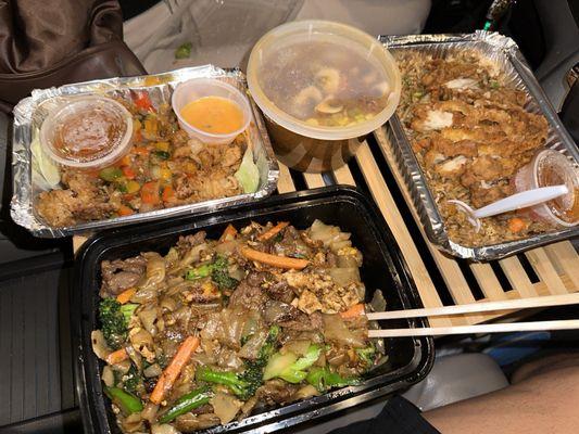 Saap Fried Calamari (top left), Tom Yum Soup (middle), Saap Fried Rice w/ Crispy Chicken (top right), Pad See Ew w/ Beef (bottom left)