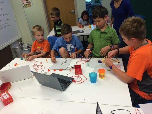 Kids explore electricity in our summer Learning Adventure Bridges to Engineering.