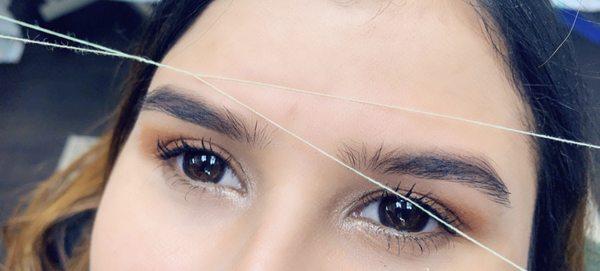 Eyebrows threading