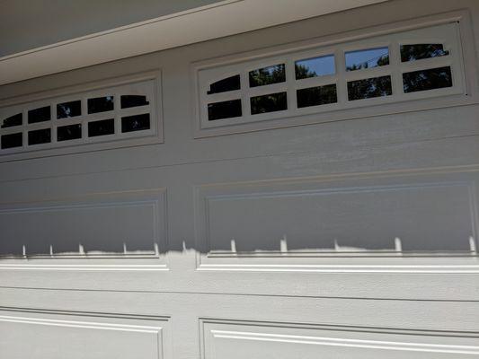 The double garage door replacing two single doors