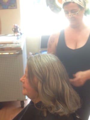 Tami almost done with this customer's cut. Looks so much better!