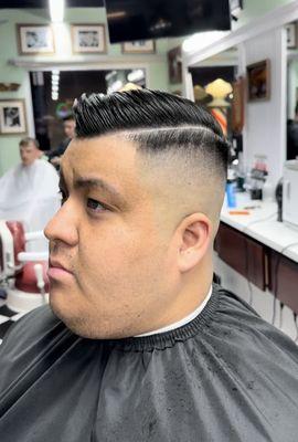 High Skin Fade Combover with a Hard Part