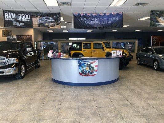 Just Inside The Front Doors In The New Car Showroom