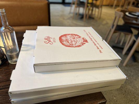 Trying to give you an idea of just how large the massive pizzas are. Custom-made boxes!