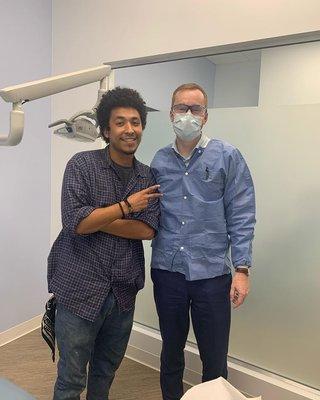 Dr. Schmitt with a patient that was so excited to get his wisdom tooth  out today!