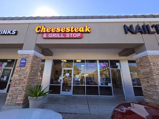 Cheesesteak and Grill Stop - closeup of outside view