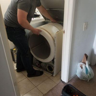 GAS DRYER being repaired