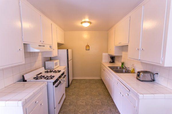 Kitchens! Our kitchens are fully equipped with dishes, silverware, cups, bowls, toaster, coffee maker, microwave, and pots/pans!